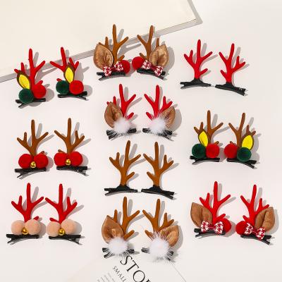 China Fashion Christmas Hair Accessories Hairpin Antlers Headwear Hair Clip Cute Cool Plush Ball Hair Clip Small for sale