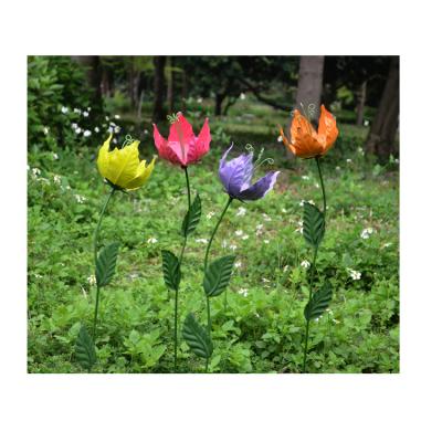 China Colorful Minimalist Metal Spring Garden Ornaments Ornamental Garden Stake Decoration for sale