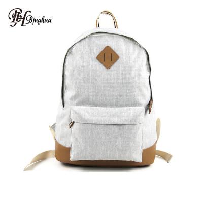 China Hot sale large capacity canvas school backpack white canvas waterproof simple backpacks for female students for sale