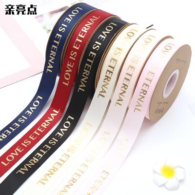 China High tenacity bronzing English decorative ribbon bouquet gift box wrap flower ribbon wire ribbon floral material for sale