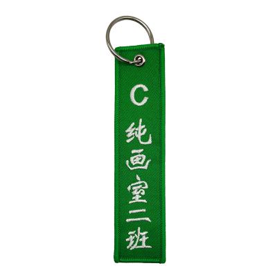 China Factory wholesale polyester/iron with metal ring embroidery brand key chain can be customized logo pattern bags suitcases for sale