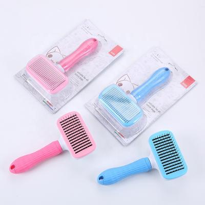 China 2022 Pet Tool Pet Grooming Massager Hot Automatic Neat Automatic Hair Removal Brush Stocked Telescopic Needle Comb For Cat And Dog for sale