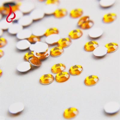 China Lan Guang 4mm Non-Hot Sale 10000pcs/bag Environmental Inspection Hot Sale 4mm Flat Back Resin Round Rhinestone For Nail Art for sale