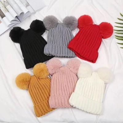 China Factory price Shenzhen double lily cheng faux fur pom beanie hat winter COMMON beanie hat for sale