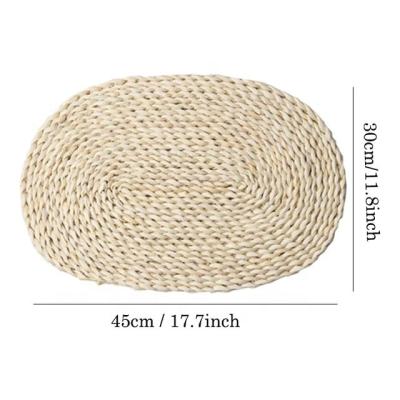 China Homeplus Sustainable New Design Oval Braided Warm Corn Hull Thick Natural Insulation Place Mats Table Pads Place Mats for sale