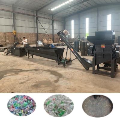 China 175 Kw Plastic Bottles Crushing Washing Drying Recycling Line for Pet Label Removing for sale