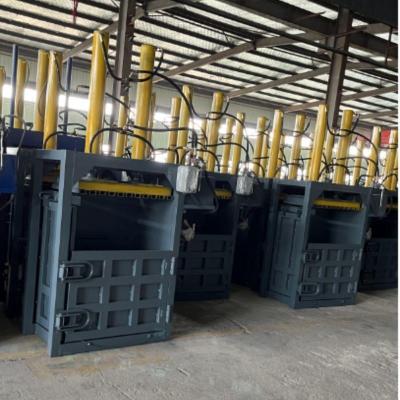 China 24 Hours Online After-sales Service PVC Vertical Hydraulic Coconut Fiber Baler for Clothes for sale