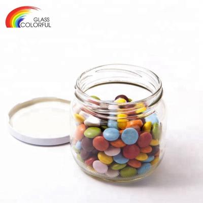 China Traditional Glass Storage Jar Small Clear Round Glass Candy Storage Jar for sale