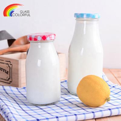 China Traditional Food Milk Storage Glass Bottle Sale Glass Safe Whole Water Bottle 200ml 300ml 400ml for sale