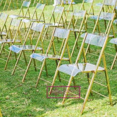 China Other New Design Outdoor Events Stainless Steel Gold Frame With Clear Folding Chairs Te koop