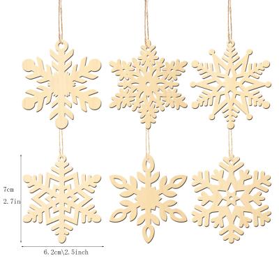 China Eco-friendly Unfinished Wooden Snowflake Ornaments Hanging Snowflake Cutouts Mask Wooden Slices With Rope Christmas Craft For Christmas Decorations for sale