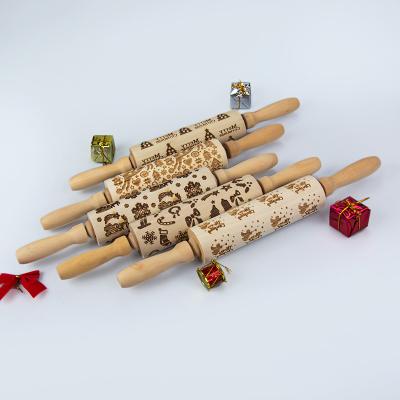 China Wooden Christmas 3D Engraved Embossing Pins Sustainable Wooden Kitchen Tool Embossing Pin With Elk Carved Wooden Roller for sale