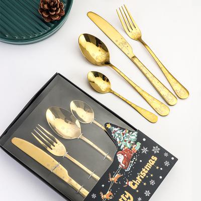 China Viable Christmas Tableware Sets 4pcs Stainless Steel Christmas Laser Elks Spoon Luxury Minimalist Custom Business Gifts for sale