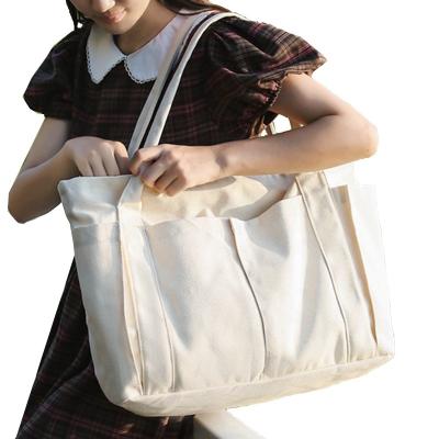 China Large Capacity Wholesale ECO Friendly Cotton Mini Shoulder Blank Canvas Tote Bag With Pocket And Zipper Tote Fashion for sale