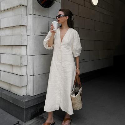 China Anti-Static French Ladies Beige Cotton Linen Puff Sleeve Dress Women Summer Open Back Loose V Neck Shirt Dress Midi Dress for sale