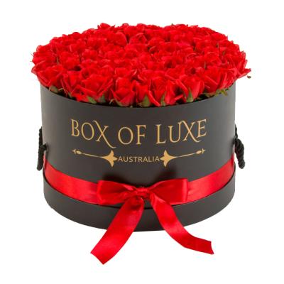 China Rose Gift Cylinder Packaging Disposable Hot Round Paper Box Luxury Round Tube Flower Box With Custom Logo for sale