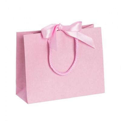 China Recycled Materials Hot Pink Cosmetic Clothing Packaging Bag Paper Gift Shopping Luxury Bag With Ribbon Handle for sale