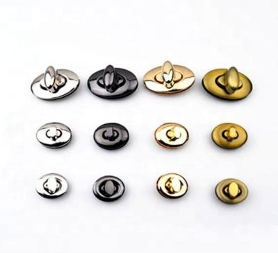 China Auto accessories oval lock, handbag security twist lock, wallet luggage hardware decorative lock for sale