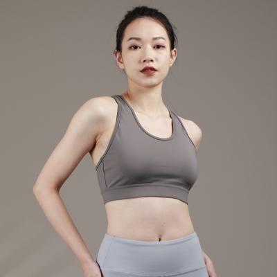 China Breathable Women's Yoga Vest Top Bra Gym Traceless Knitted Quick Dry Sports Bra for sale