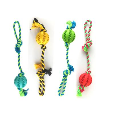 China Viable Pet Silicone Chew Toy With Cotton Pull Rope Dog Teeth Cleaner Toy Leakage Food Ball for sale