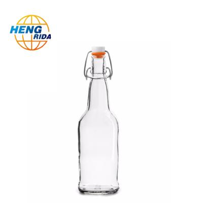 China 16oz Beverage Swing Top Glass Bottle Storage Jar Container For Beer Water Juice for sale