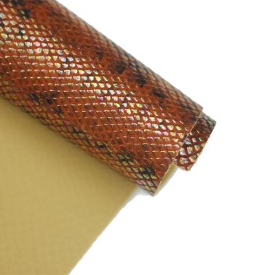 China Faux Waterborne Embossed Snakeskin PU Synthetic Leather Fabric For Bags for sale