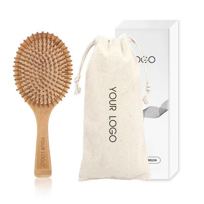 China Cushion Factory High Quality Wooden Paddle Toothbrush Customized Logo Natural Bamboo Brush For Hair for sale