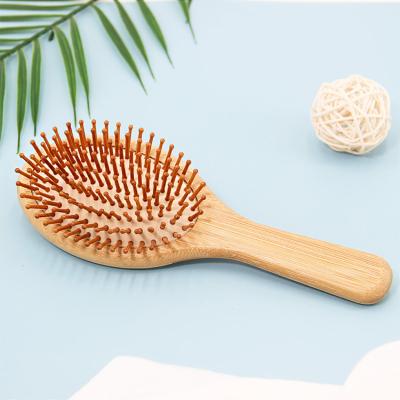 China Eco-friendly Hot Selling Bamboo Wood Hair Brush Wholesale Private Label Paddle Cushion Air Brush for sale