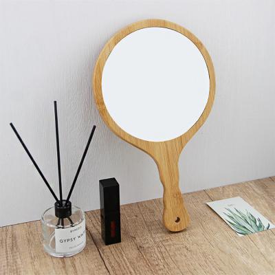 China Customized Customized Logo Makeup Eco-friendly Bamboo Hand Mirror Round Bamboo Mirror for sale