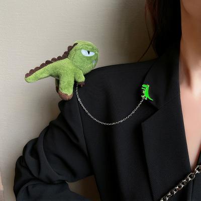 China Cute Small Dinosaur Fashion Unique Plush Doll Brooch Pendant Bag Accessories Chain Couples Brooch for sale