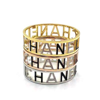 China 2021 Letters Charm Stainless Steel Environmental Friendly Gold Plated Diamond Crystal Bangles And Bracelets For Woman for sale