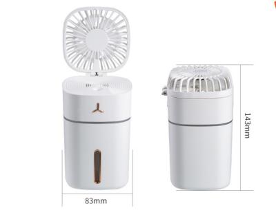 China Portable Colorful Hotel Spray Fan Mini Household Lamp Humidifier Desktop USB Charging Desk Fan for sale