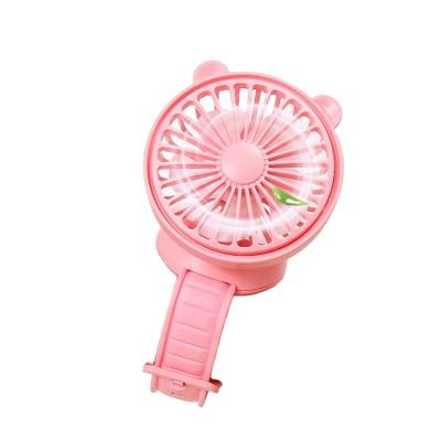 China Electric Rechargeable Portable Watch Style Mini Cooling Air USB Fan With Button Automatic Charging Base for sale