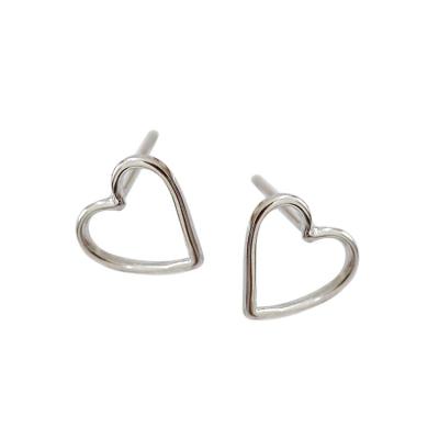 China AEKKI 925 Edition Korean Love Earrings All-match Korean Love Earrings Sterling Silver Minimalist Version Heart Hollow Stud Earrings Wholesale for sale