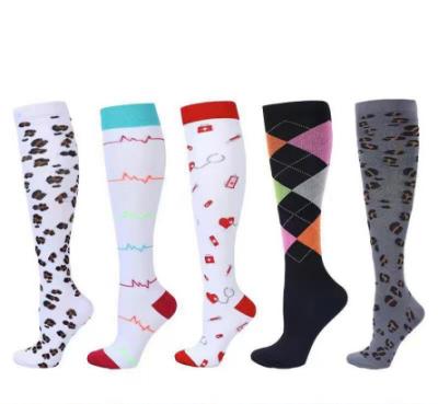 China Long Tube Socks Women Compression Nylon Breathable Cycling Socks Machine High Quality Sports Socks Wholesale Style for sale