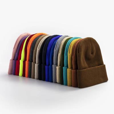 China COMMON Fashionable Custom Embroidery Solid Color Cheap Price Logo Winter White Warm Beanie for sale