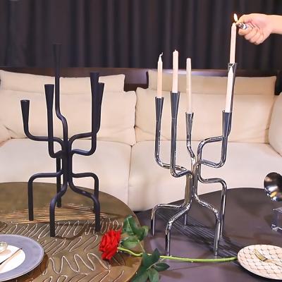 China Luxury wedding table centerpieces open iron tall candlestick for party event decoration metal stand candle holder stick for sale