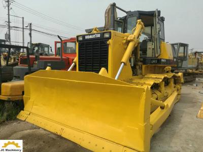 China Niveladora usada D85-21 nuevamente repintada de KOMATSU 23610 kilogramos de peso de funcionamiento en venta