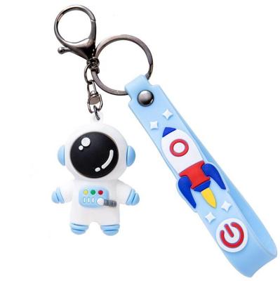 China Creative Fashionable 3D Soft Rubber Keychain Lanyard Bags Cute Astronaut Pendant Keychain Cartoon Car Accessories for sale