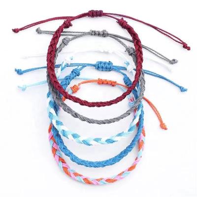 China Surfing Wax Bracelets New Popular Handmade BOHEMIA Beach Colorful Waterproof Rope Woven Bracelet for sale