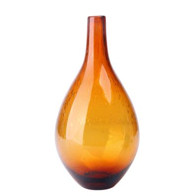 China Minimalist Vintage Stocked Streamlined Floor Bellied Retro Amber Glass Vase With Wide Base for sale