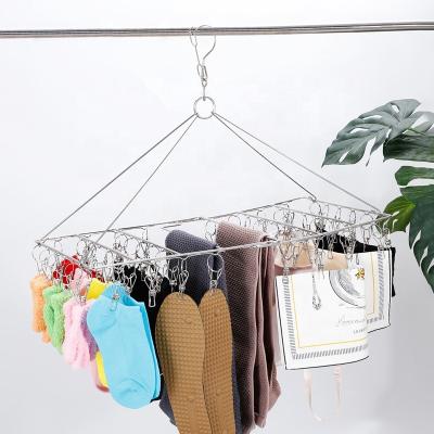 China Windproof Stainless Steel Clothespin Folding Hanger Drying Rack Hanger Stainless Steel Laundry Folding Socks Hangers with 52 Pegs for sale