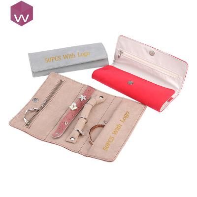 Chine Wholesale Recyclable White Travel Pouch Foldable Jewelry Display Bag Leather Organizer Holder Velvet Small Roll à vendre