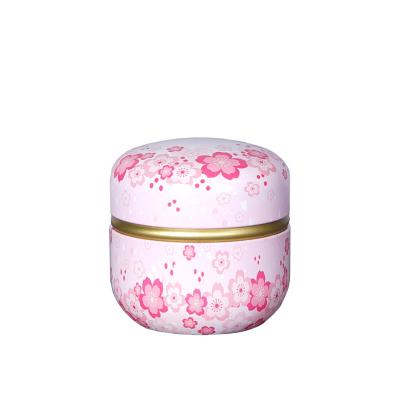 China Japanese Candy Sweets Wedding Gift Stainless Steel Round Pattern Floral Tea Tins Containers Yellow Green Floral Canister Tea Canister for sale