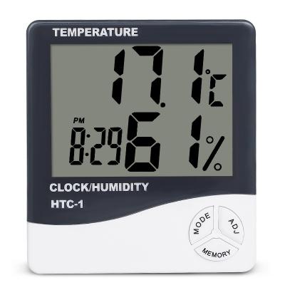 China ABS Digital Indoor Outdoor Weather Temperature LCD Humidity Meter Electronic Thermometer Hygrometer Monitor Station with Clock HTC-1 for sale