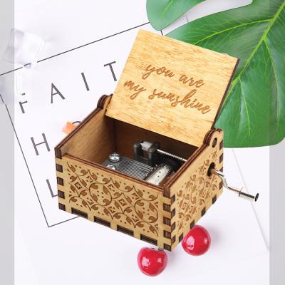 China Mini Music Crank You Are My Sunshine Wooden Laser Engraving UV Color Printing Music Box for sale