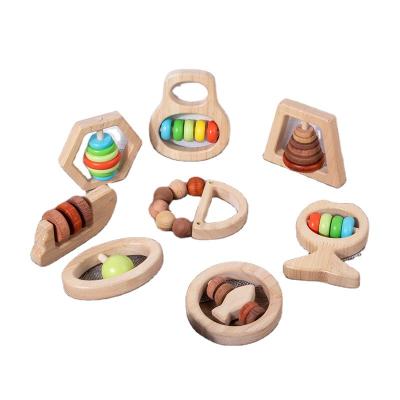 China Early Educational Montessori Education Wooden Toddler Toy Baby Can Chew Hand Rattle Study To Soothe Catch Toy for sale