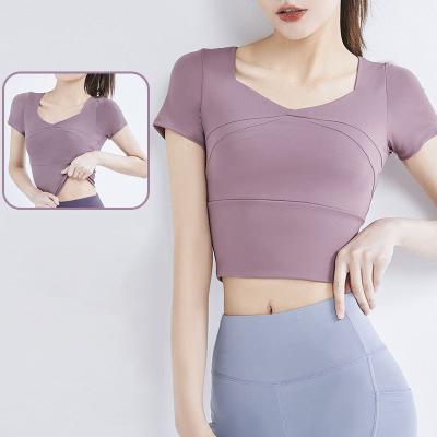 China Anti-Bacterial Hot selling tight yoga short sleeve speed dry high elastic naked feeling thin yoga clothes top bra free For women's fitness top for sale