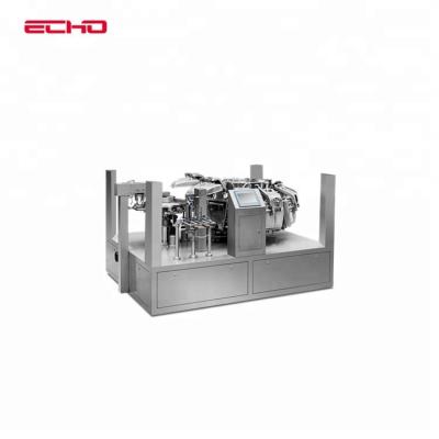 China CLOTHING ECHO Rotary Automatic Tetra Big Pouch Vacuum Packing Line for sale