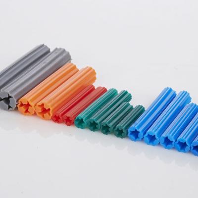 China Easy To Install Cheap Whole Socket Colored Plastic Expansion Hollow Candle Style Wall Anchor Sizes Wall Anchor for sale